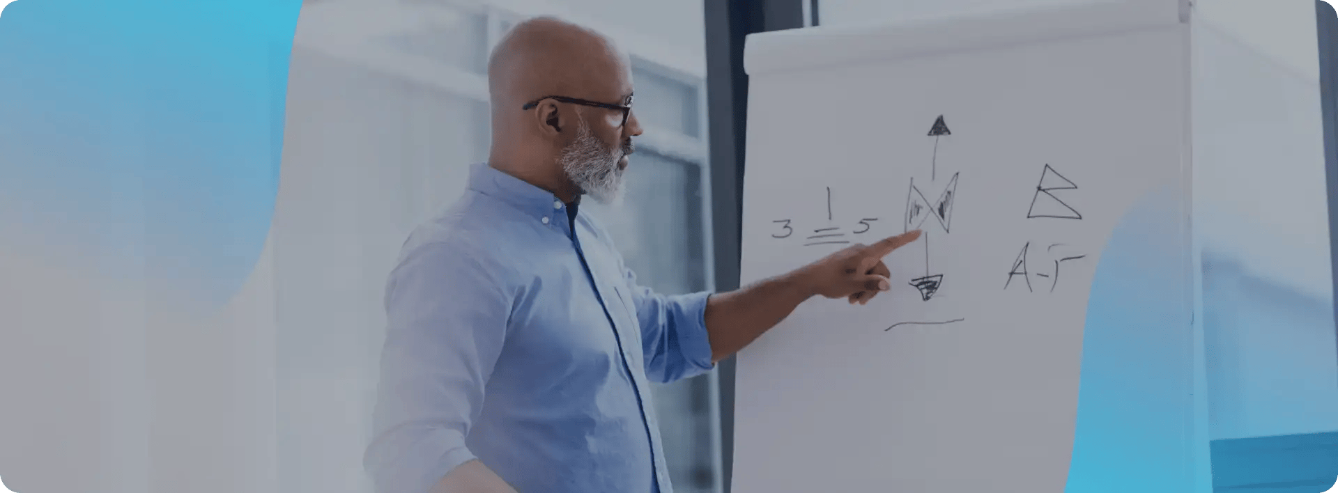 Man pointing at diagram in a sales training